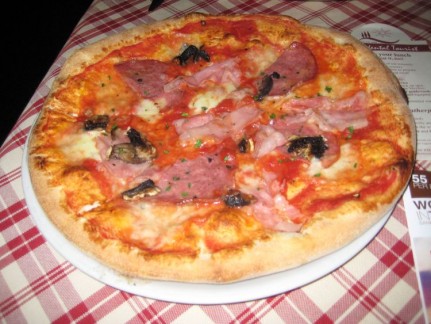 This pizza has a thicker base than most pizzas you get in Italy. They all taste better than what we know pizza to be....