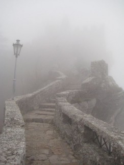 A foggy path to a castle in San Marino