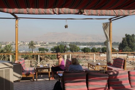 Elissa on the terrace of our hotel in Luxor. Nile river in the back ground